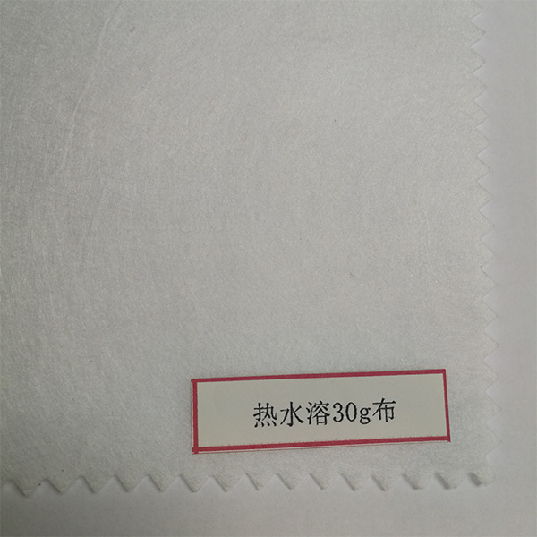 Hot water soluble nonwoven